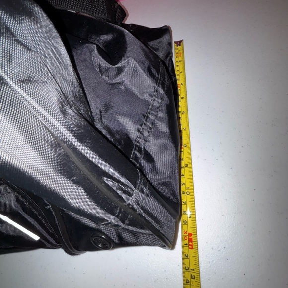 Black Duffel Bag with White Accents and Modern Design - Picture 8 of 13